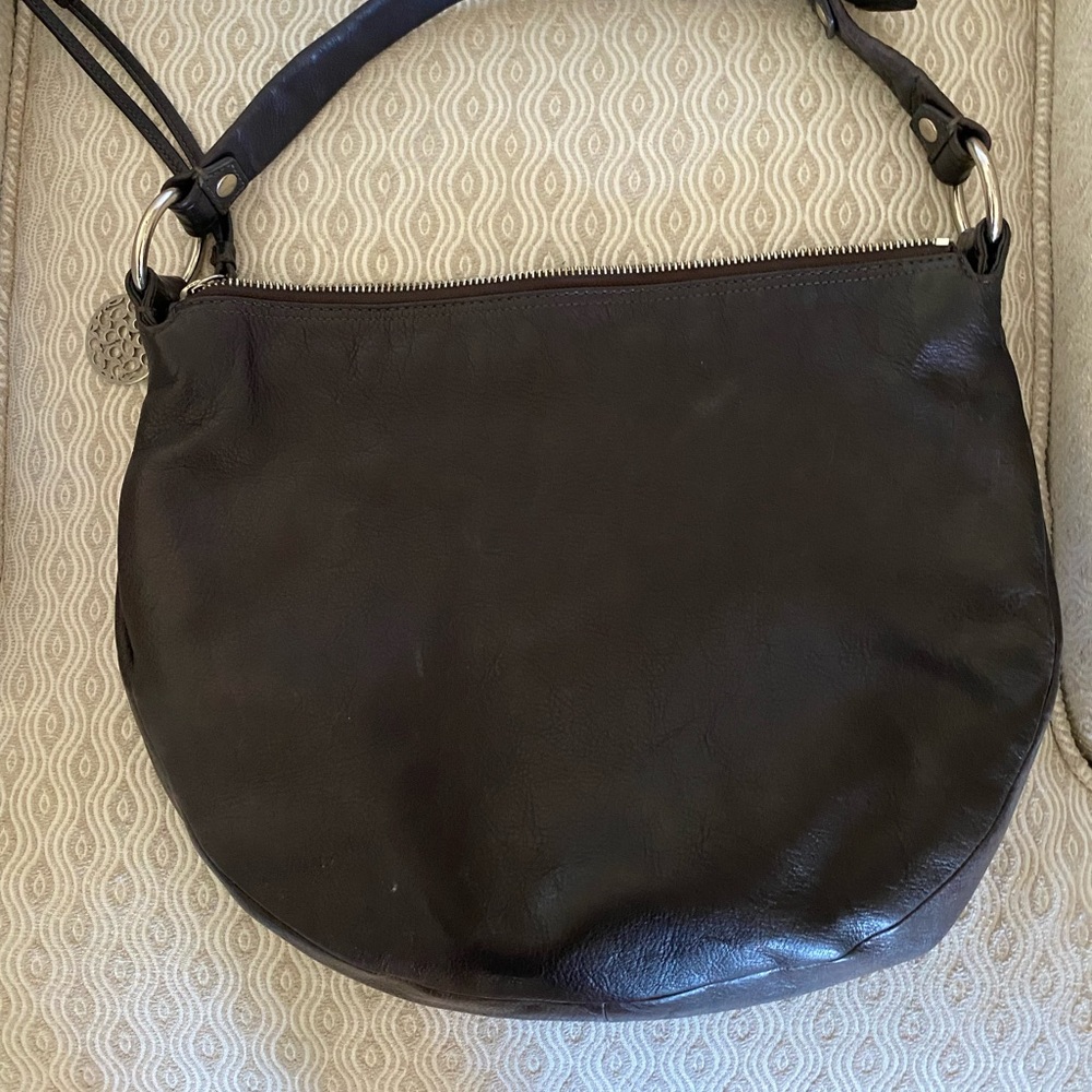 Versatile Coach chocolate leather Hobo bag.